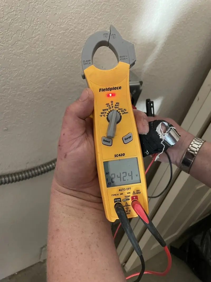 Voltage testing with clamp meter during Generator Installation in Santa Clara